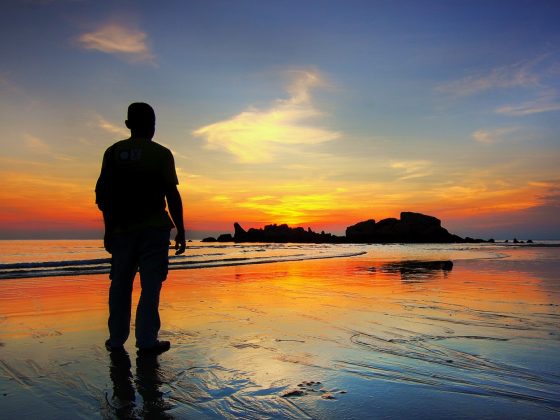 man in the sea shore